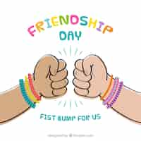Free vector friendship day background with fists