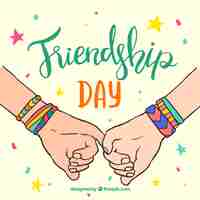 Free vector friendship day background with hands