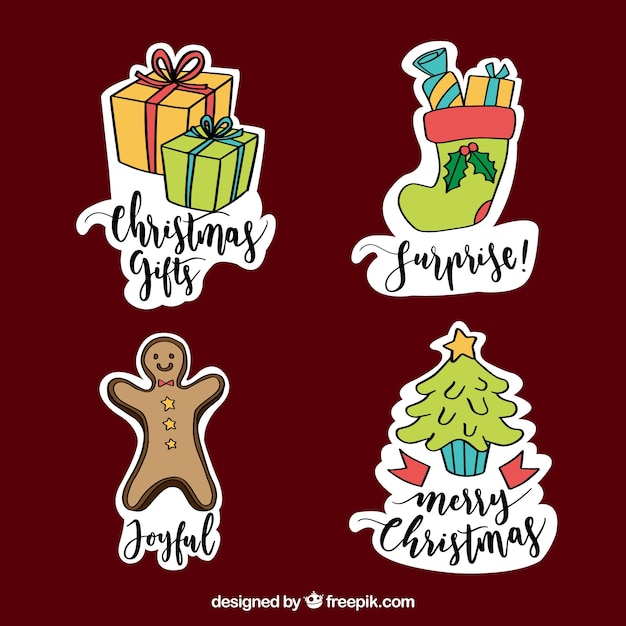 Free vector fun pack of hand drawn christmas labels