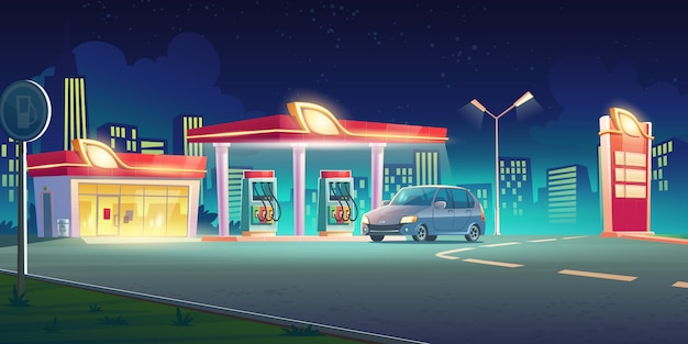 Gas station with oil pump and market at night