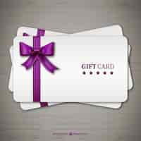 Free vector gift cards with purple ribbon