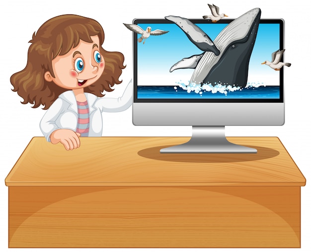 Girl next to computer with humpback whale background