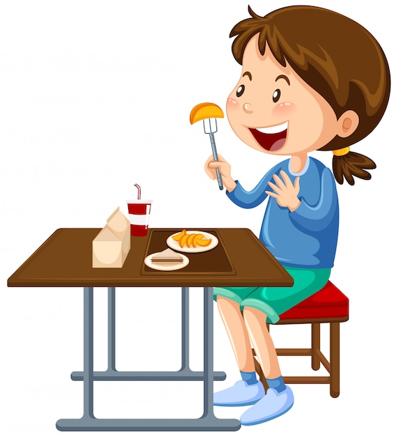 Девочка ест за обеденным столом столовой