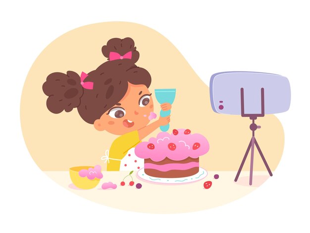 Девушка-блогер готовит сладкий торт, снимает видео, использует смартфон Забавный ребенок, создающий контент своими руками, нанося взбитые сливки на выпечку