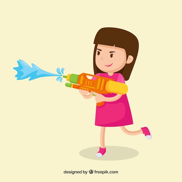 Girl playing with colorful water gun