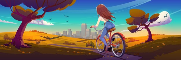 Girl rides on bike on road to city in fall
