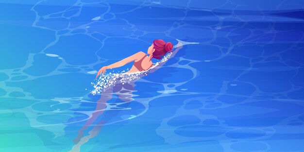 Girl swims in sea, ocean or pool top view