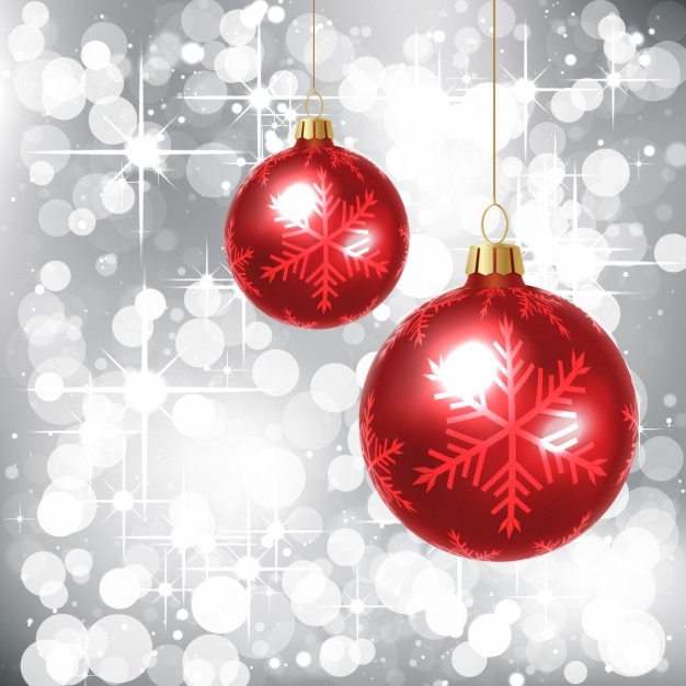 Glitter silver background with red baubles
