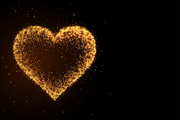 Glowing golden glitter heart black background
