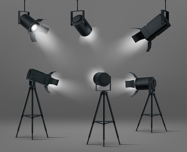 Free vector glowing spotlights for studio or stage