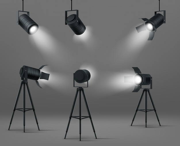 Free vector glowing spotlights for studio or stage