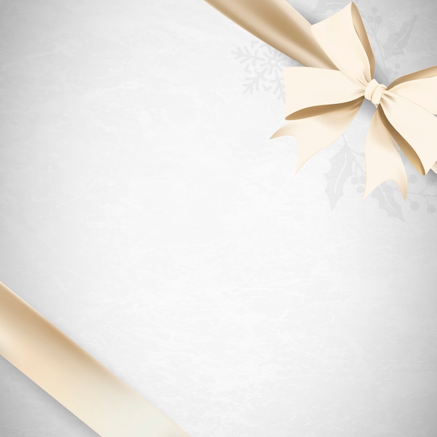 Gold ribbon bow on gray background