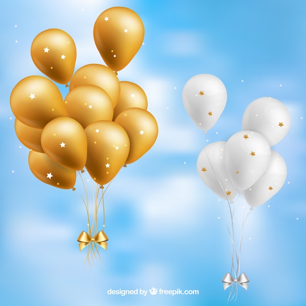 Gold and white balloons bunch collection in the sky