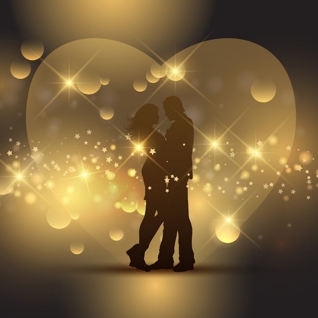 Vettore gratuito silhouette di una coppia di san valentino di fronte a un cuore d'oro