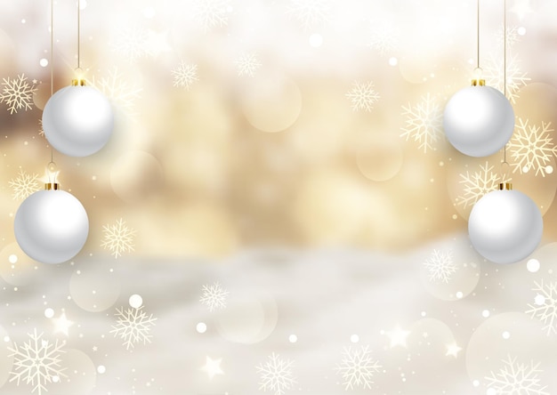 Golden christmas background with hanging baubles on defocussed landscape