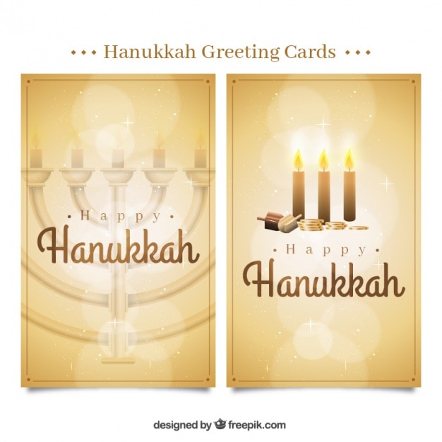 Golden hanukkah greeting cards with bokeh effect