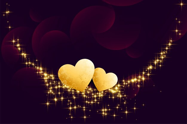 Golden hearts with sparkles on dark background