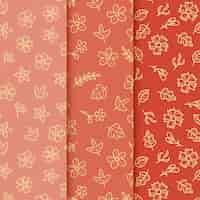 Free vector golden leaves on red background hand drawn spring pattern