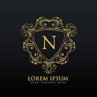 Free vector golden ornamental logo with the letter n