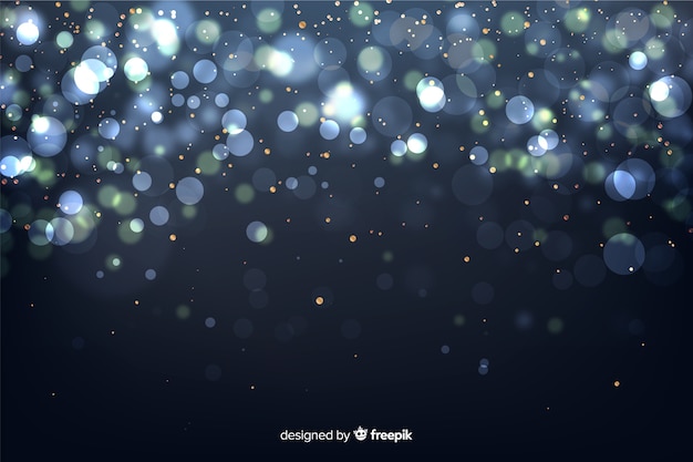 Free vector golden particles background in bokeh style