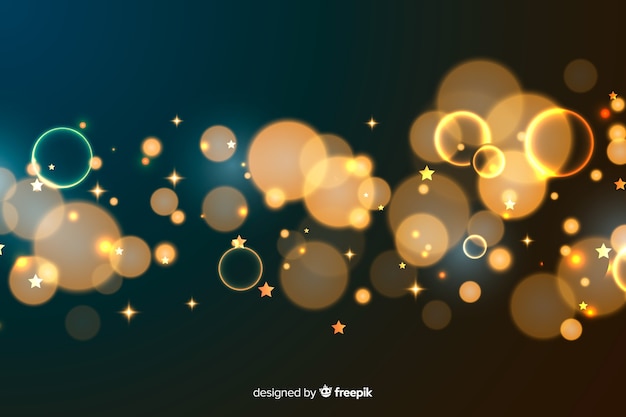 Golden particles bokeh decorative background