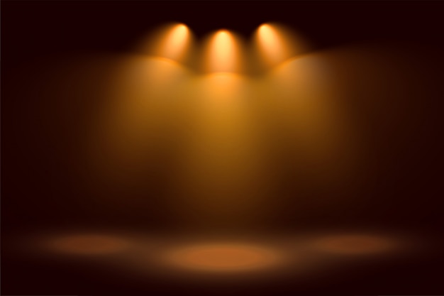 Free vector golden three spotlights and stage background