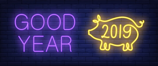 Good year neon text with pig