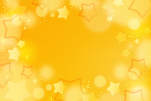 グラディエントの黄色い星の背景