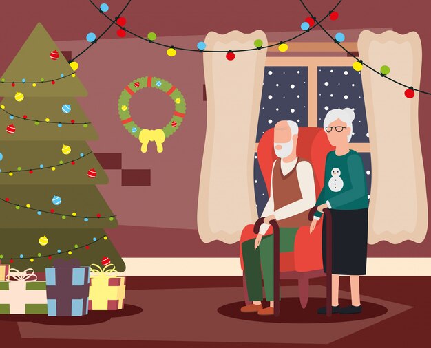 Grandparents couple in living room with christmas decoration