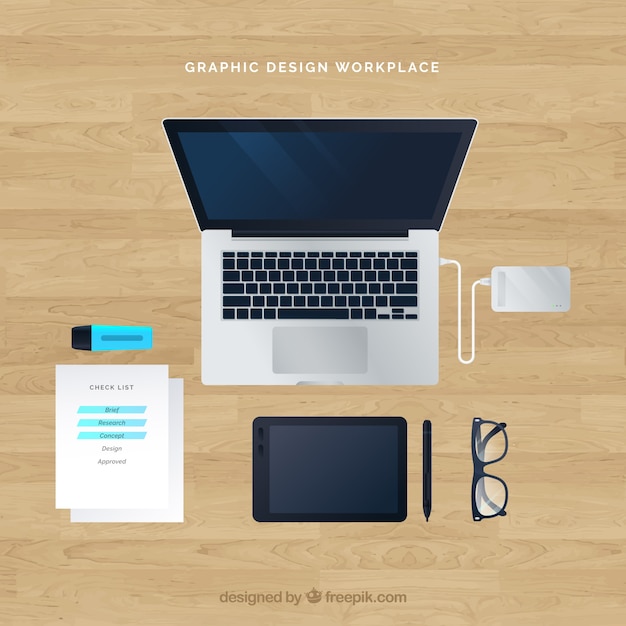 Graphic design workplace background with top view