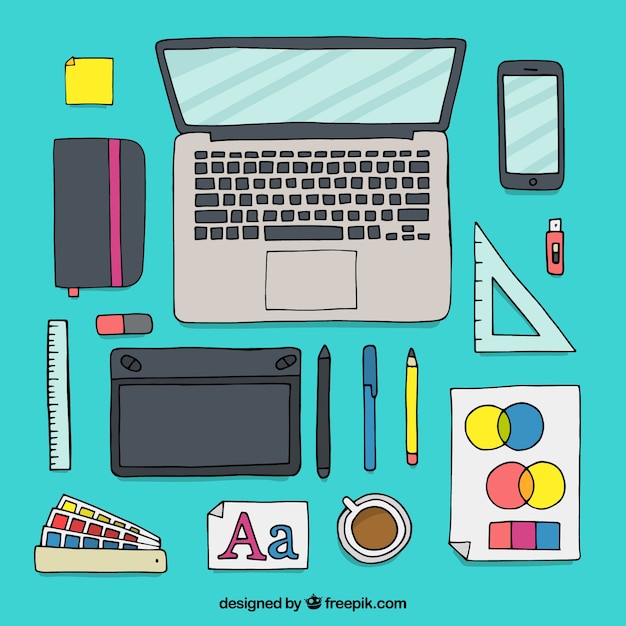 Free vector graphic design workspace background in hand drawn style