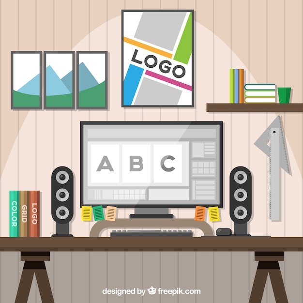 Free vector graphic design workspace background with desk and tools