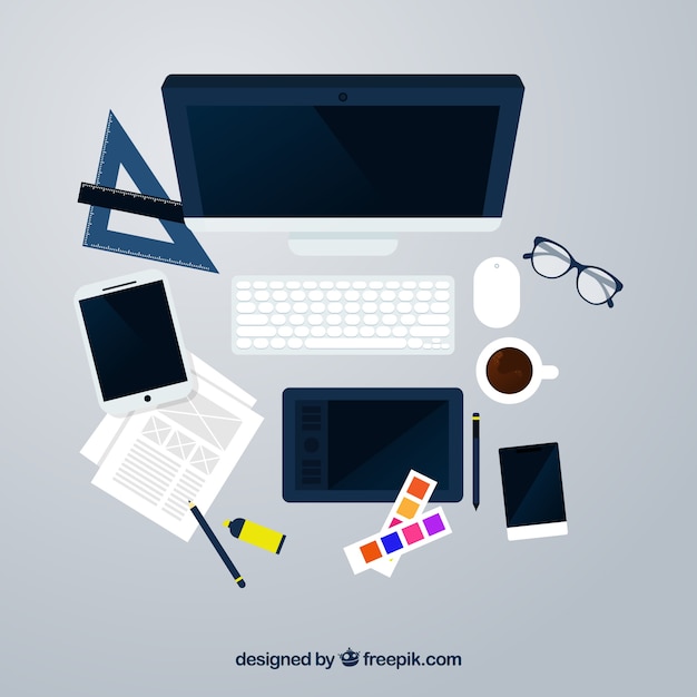 Graphic design workspace background with desk and tools