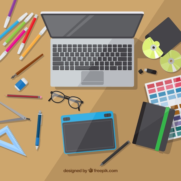 Graphic design workspace background with desk and tools