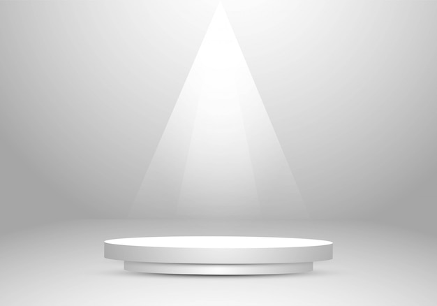 Gray studio background with podium spotlight