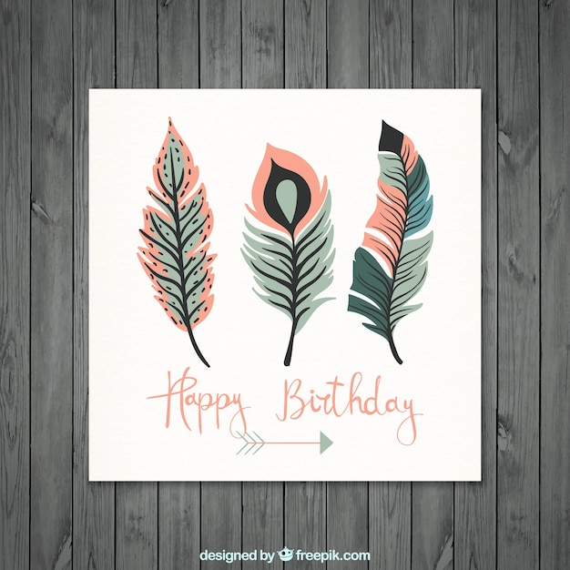 Free vector great greeting card with colored feathers