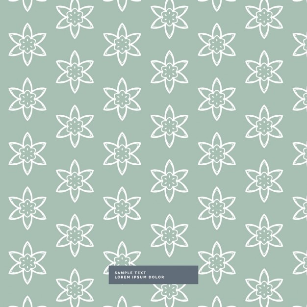 Free vector green background with a beautiful floral pattern