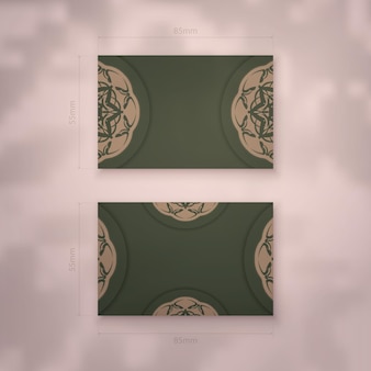 Green business card template with luxurious brown pattern for your personality.