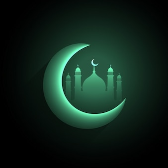 Green crescent moon with mosque background