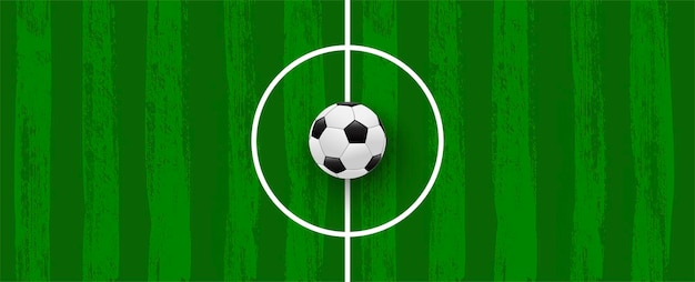 スポーツトーナメントや競技会のための現実的なサッカーボールバナーテンプレートとブラシストロークで作られた緑のサッカー場