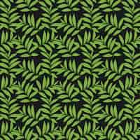 Free vector green leaves pattern on black background