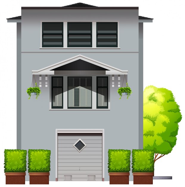 grey House with plants and tree