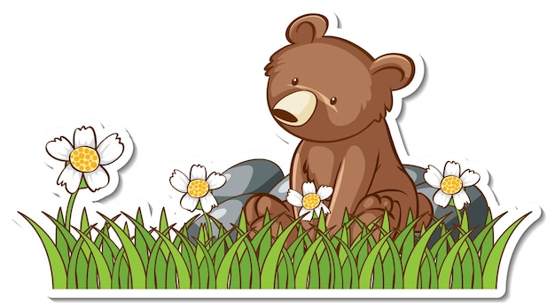 Grizzly bear sitting in a grass field sticker