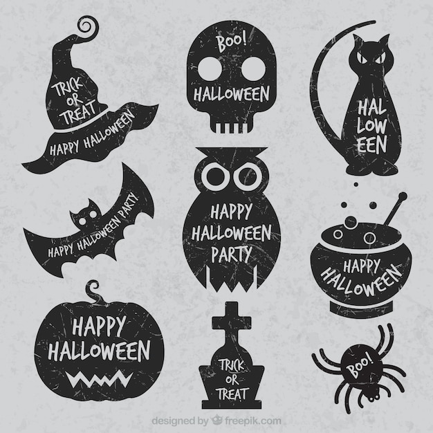 Free vector grunge halloween labels