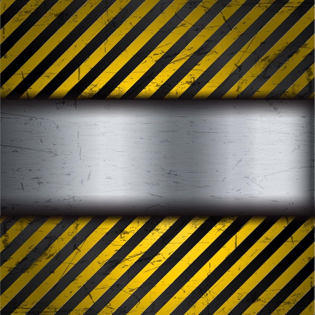 黄色と黒の警告ストライプとグランジ金属背景