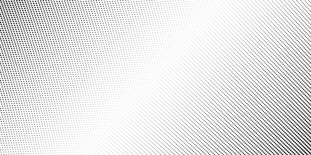 ハーフトーンの背景の抽象的な黒と白のドットの形