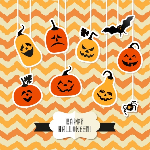 Free vector halloween background with orange pumpkins