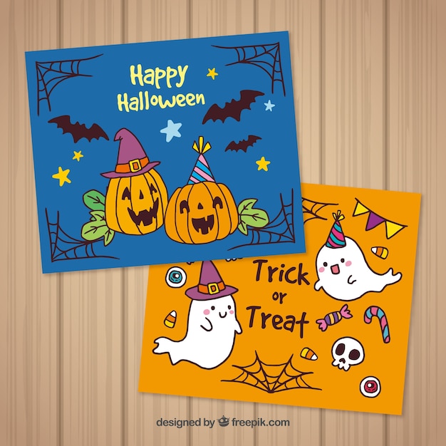 Free vector halloween cards with pumpkins and ghosts