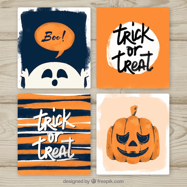 Free vector halloween cards with watercolor style