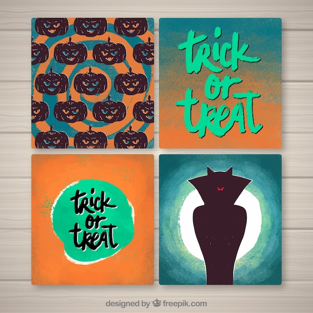 Free vector halloween cards with watercolor style